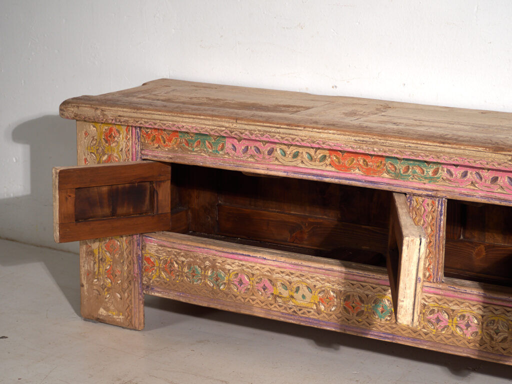 Antique carved low cabinet with drawers in pine – Xinjiang, circa 1900