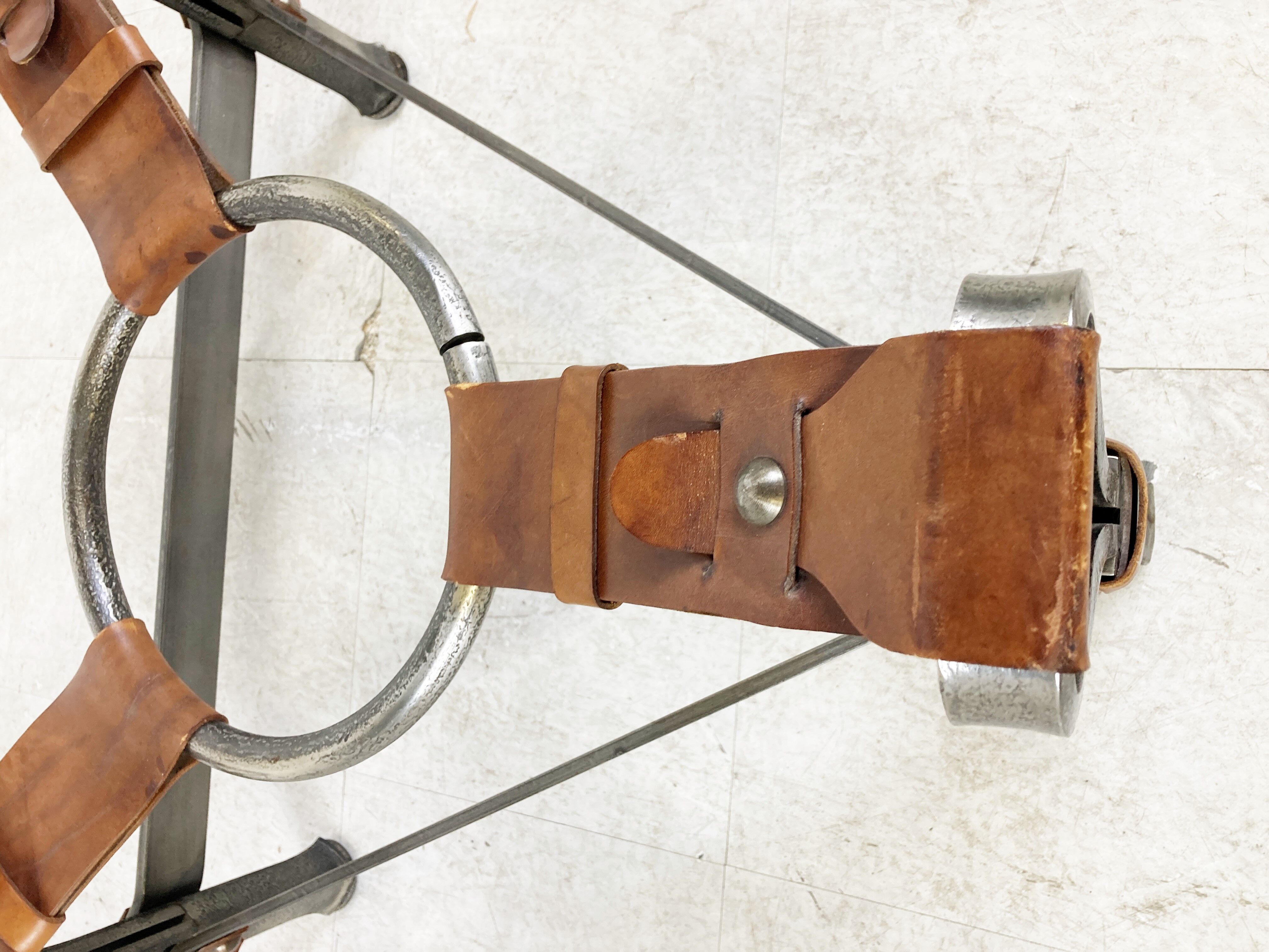 Mid century iron and leather coffee table, 1950s