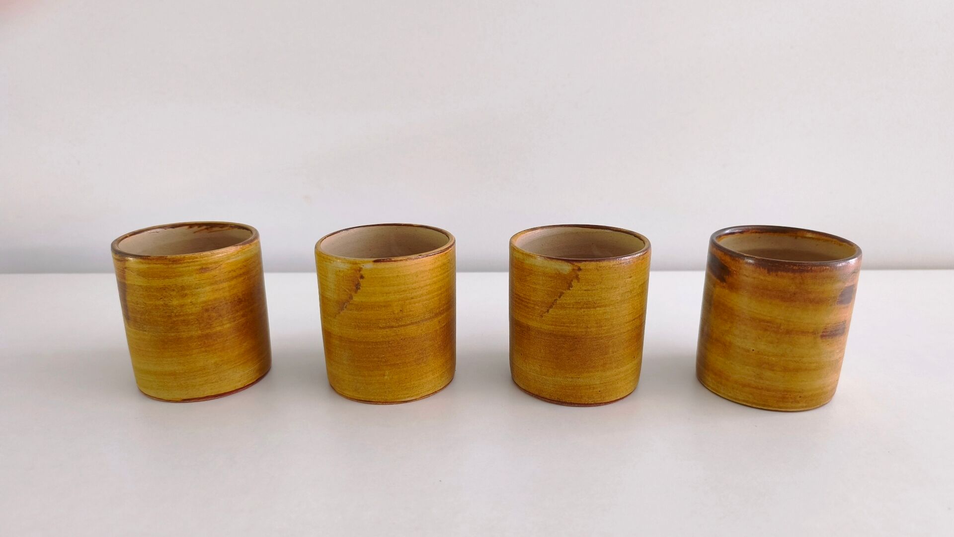Set of 4 ceramic mugs signed Peyron