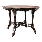 Table centrale octogonale ébénisée victorienne par C. Hindley & Sons, 19e siècle.