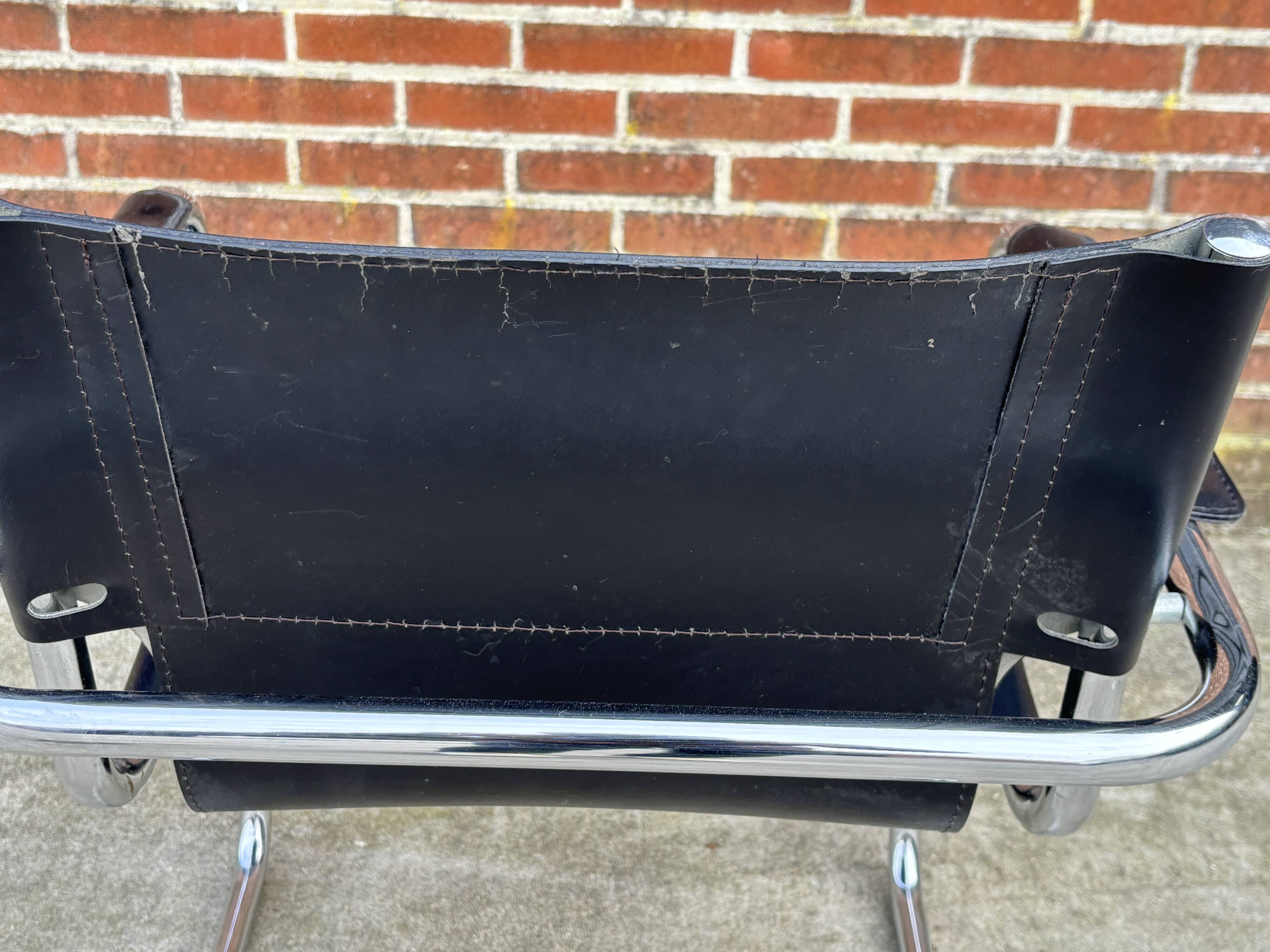 Set of 4 design cantilever chairs black and chrome design made in Italy