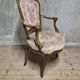 Vintage Louis XV style carved armchair with floral upholstery, 20th century, 90 × 58 cm
