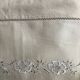 Antique embroidered linen with a floral motif