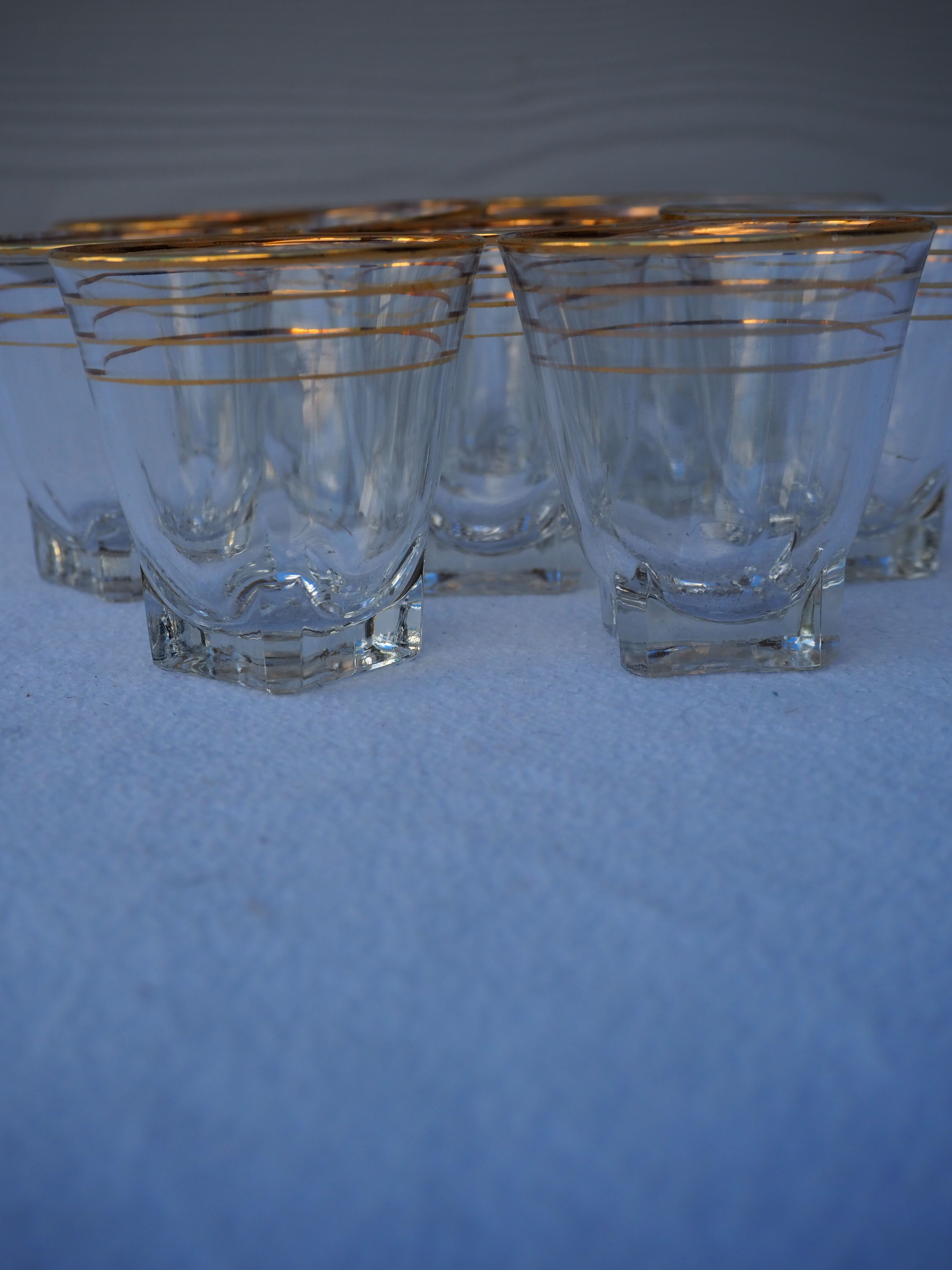 Golden liqueur service from the 1950s-1960s and its 12 glasses