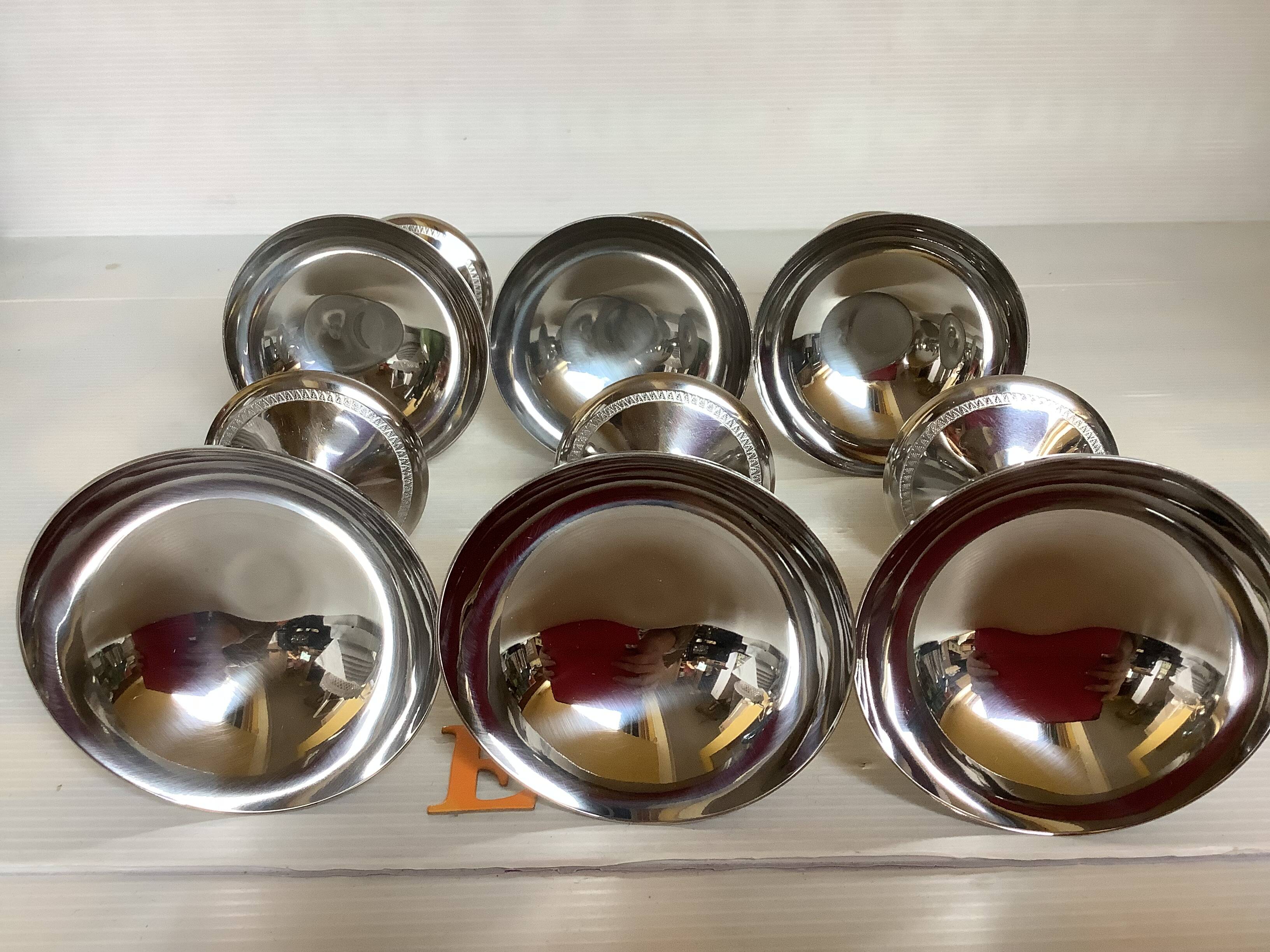 6 footed bowls with silver frieze in metal for ice.