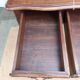 Louis XV style desk in wood, with a brown leather top.