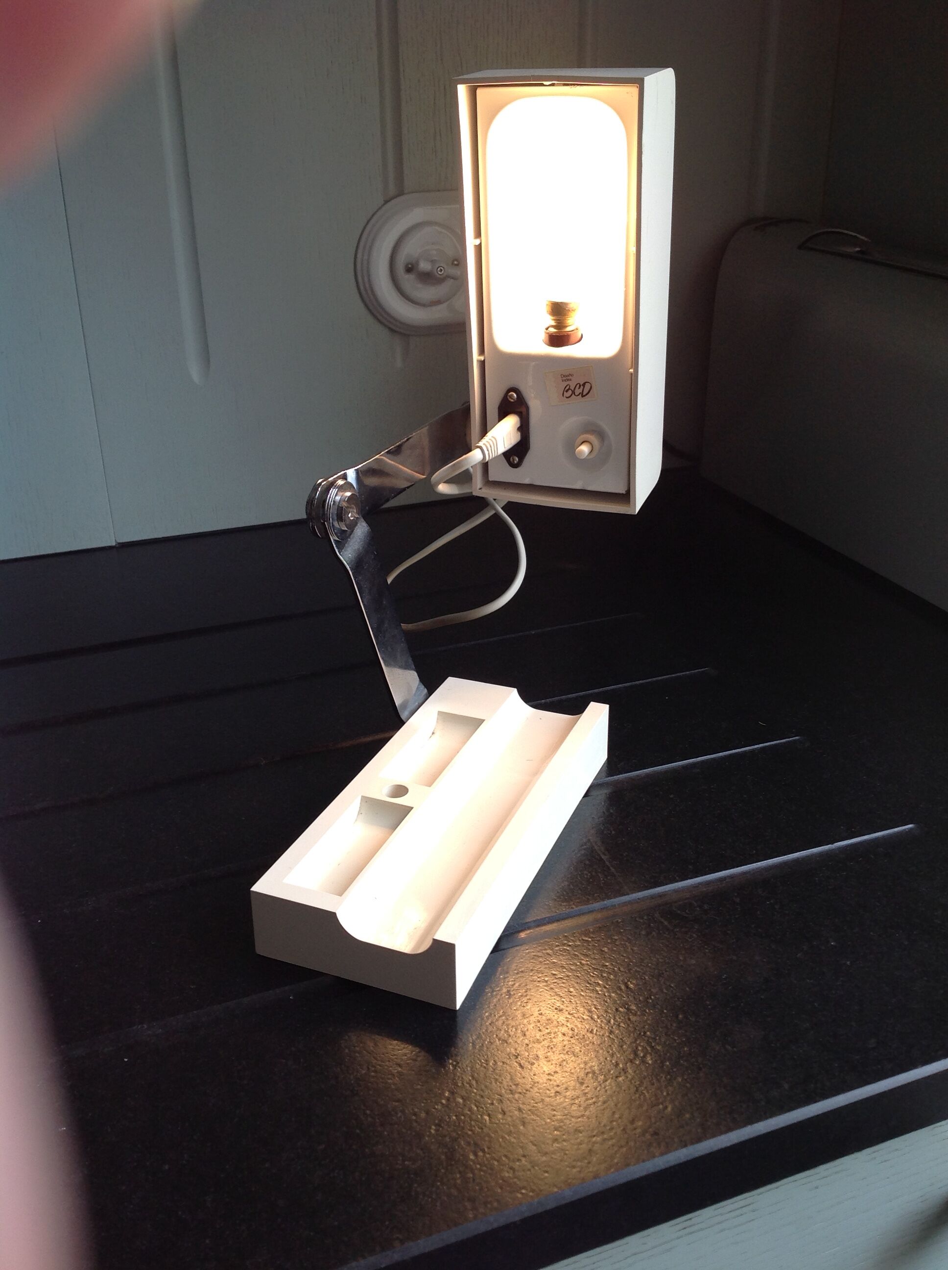 Vintage travel lamp adjustable and folding, 70s; folded it becomes a box.