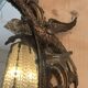 Large gilded wooden mirror, richly carved with winged dragons, 19th century