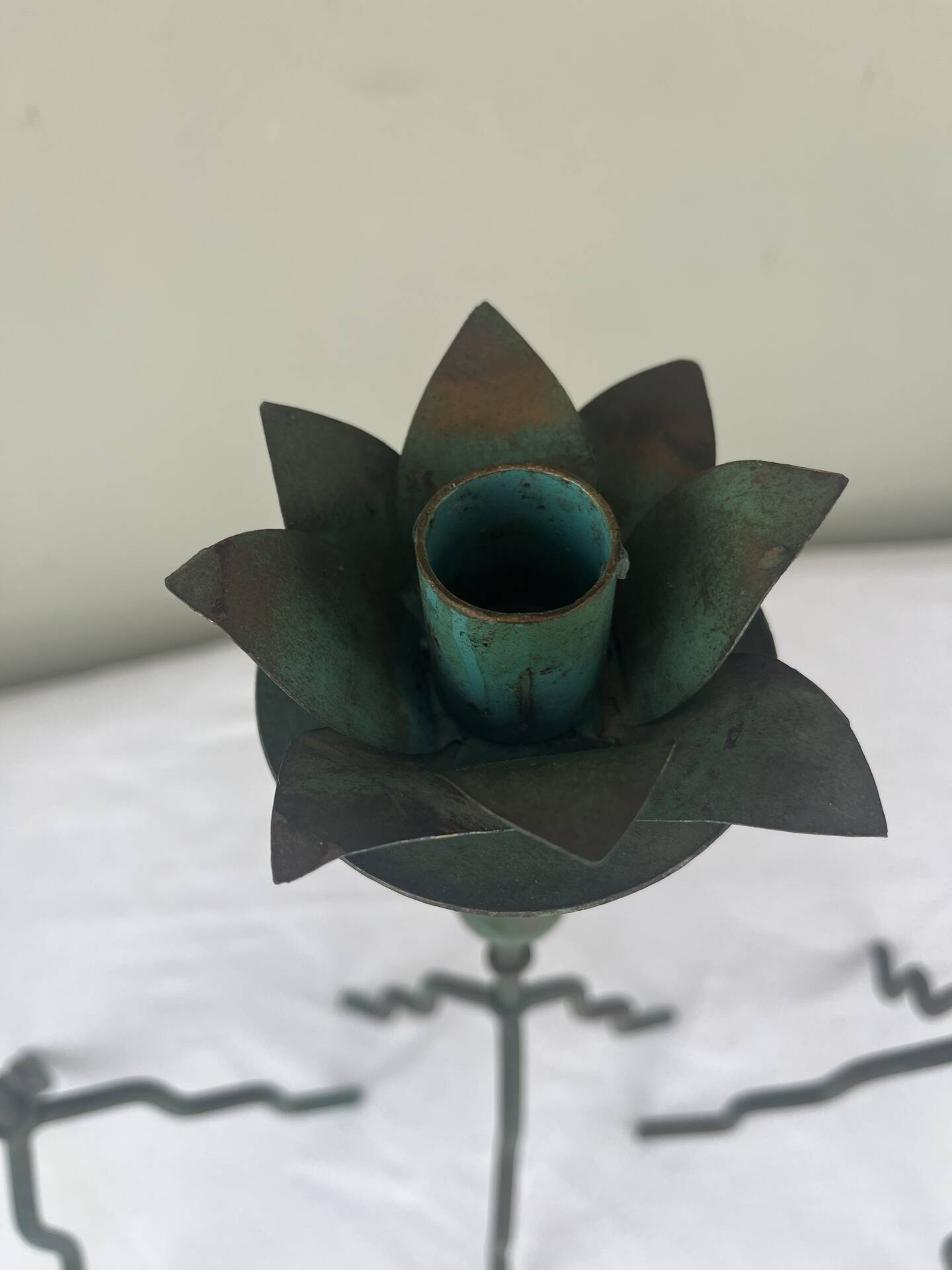 Sculptural candle holder trio