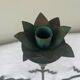 Sculptural candle holder trio