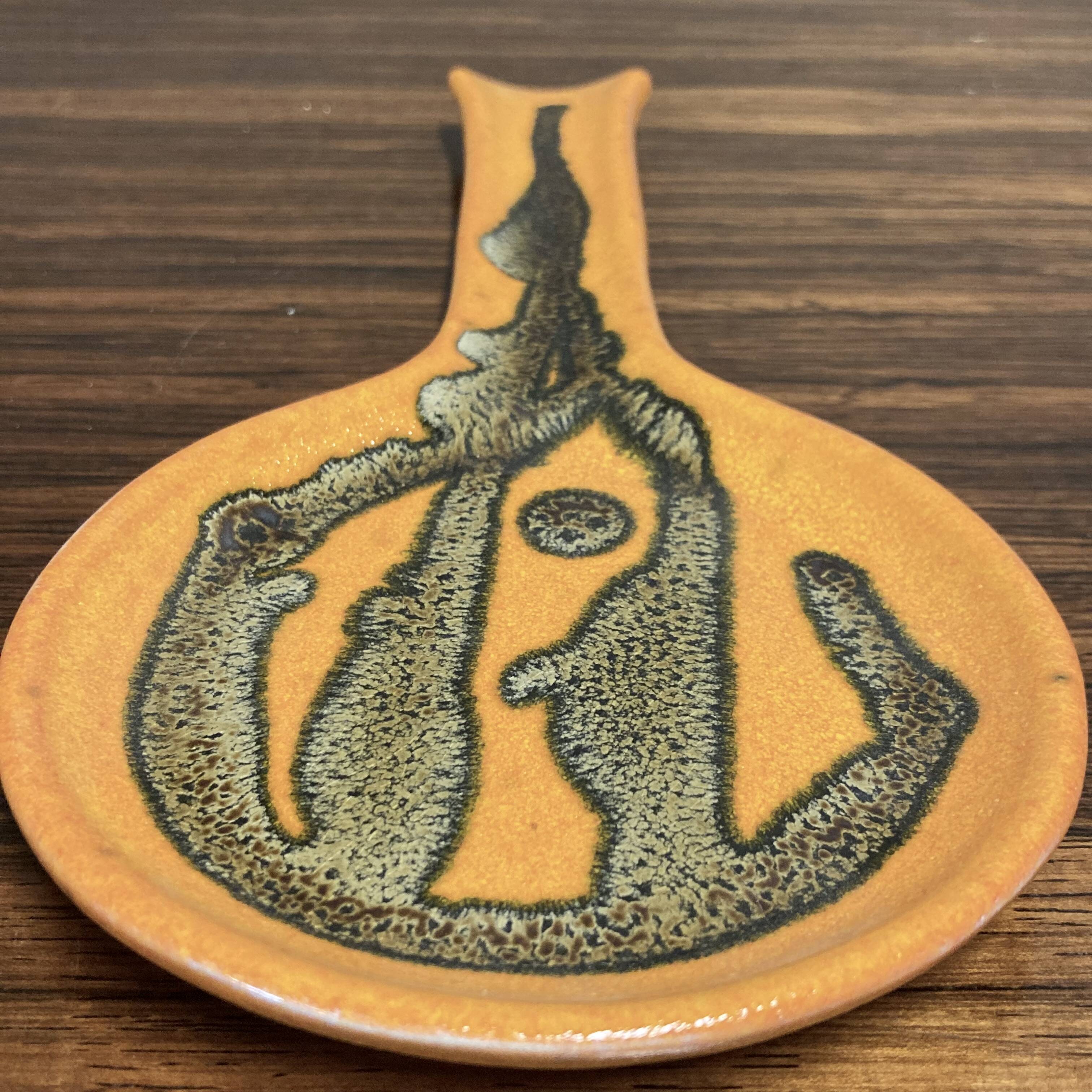 Pair of entirely handmade ceramic spoons.