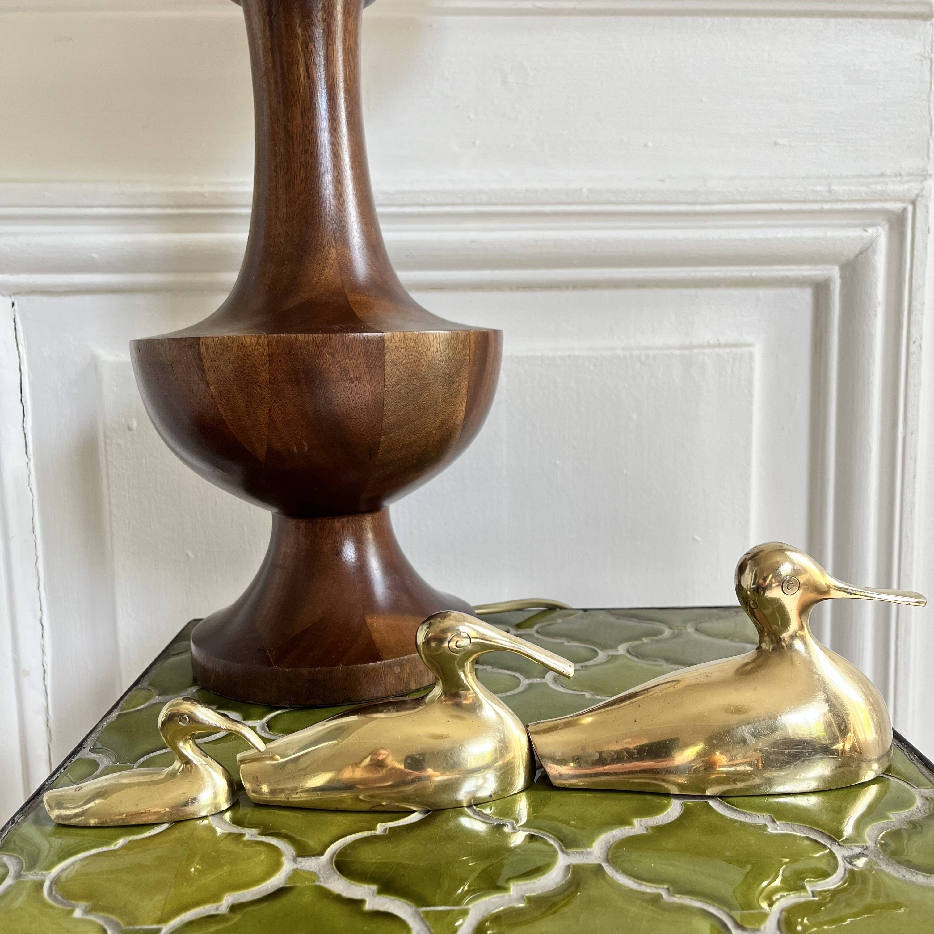 Three brass ducks from the 1950s