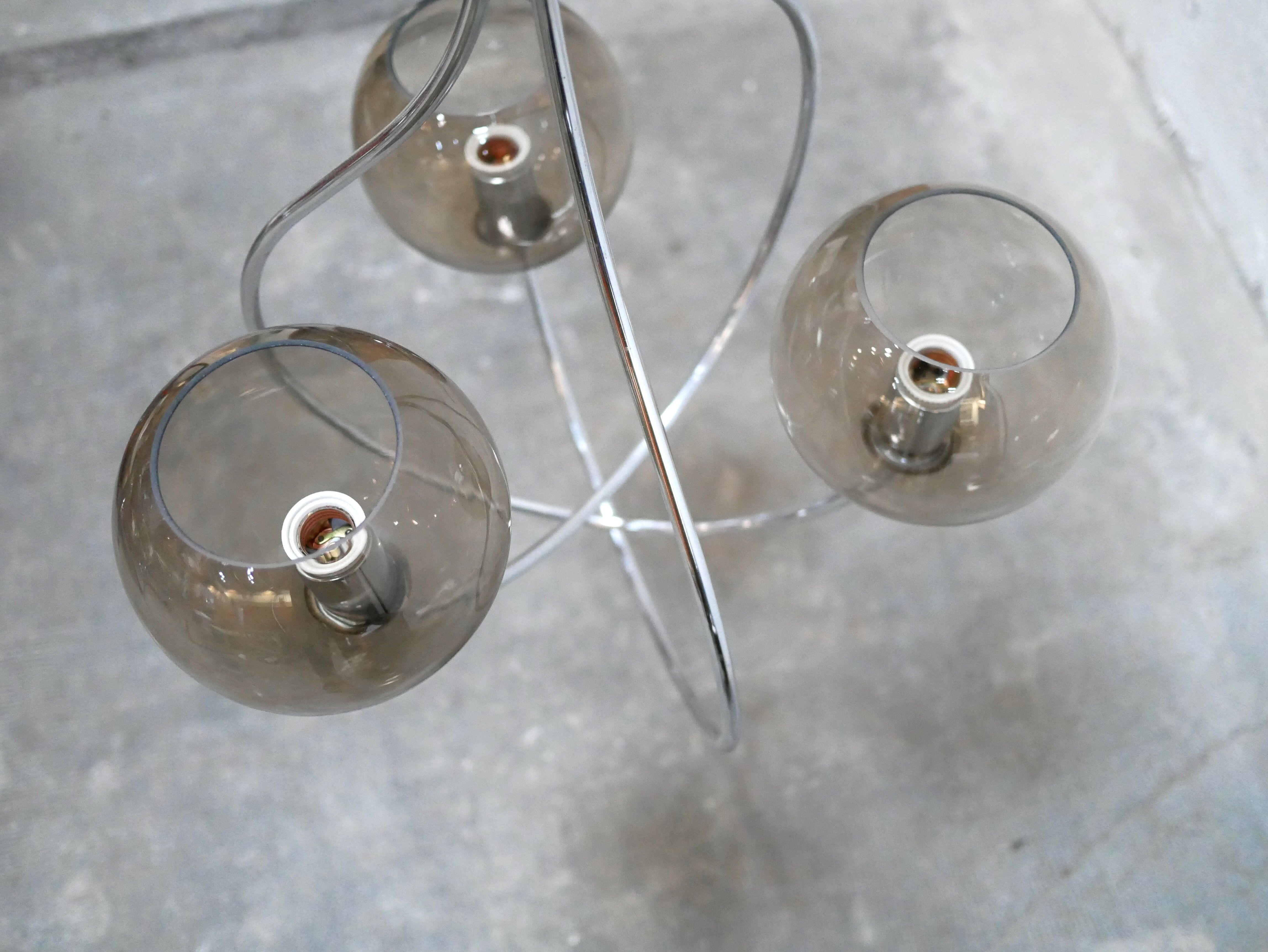 Vintage chandelier in chromed metal and smoked glass