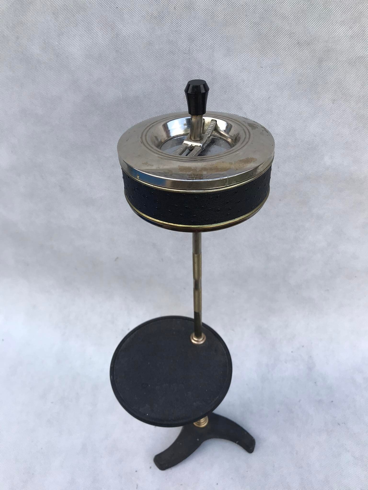 Brass ashtray on the leg from the 70's