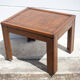 Table basse bois dessus parquet