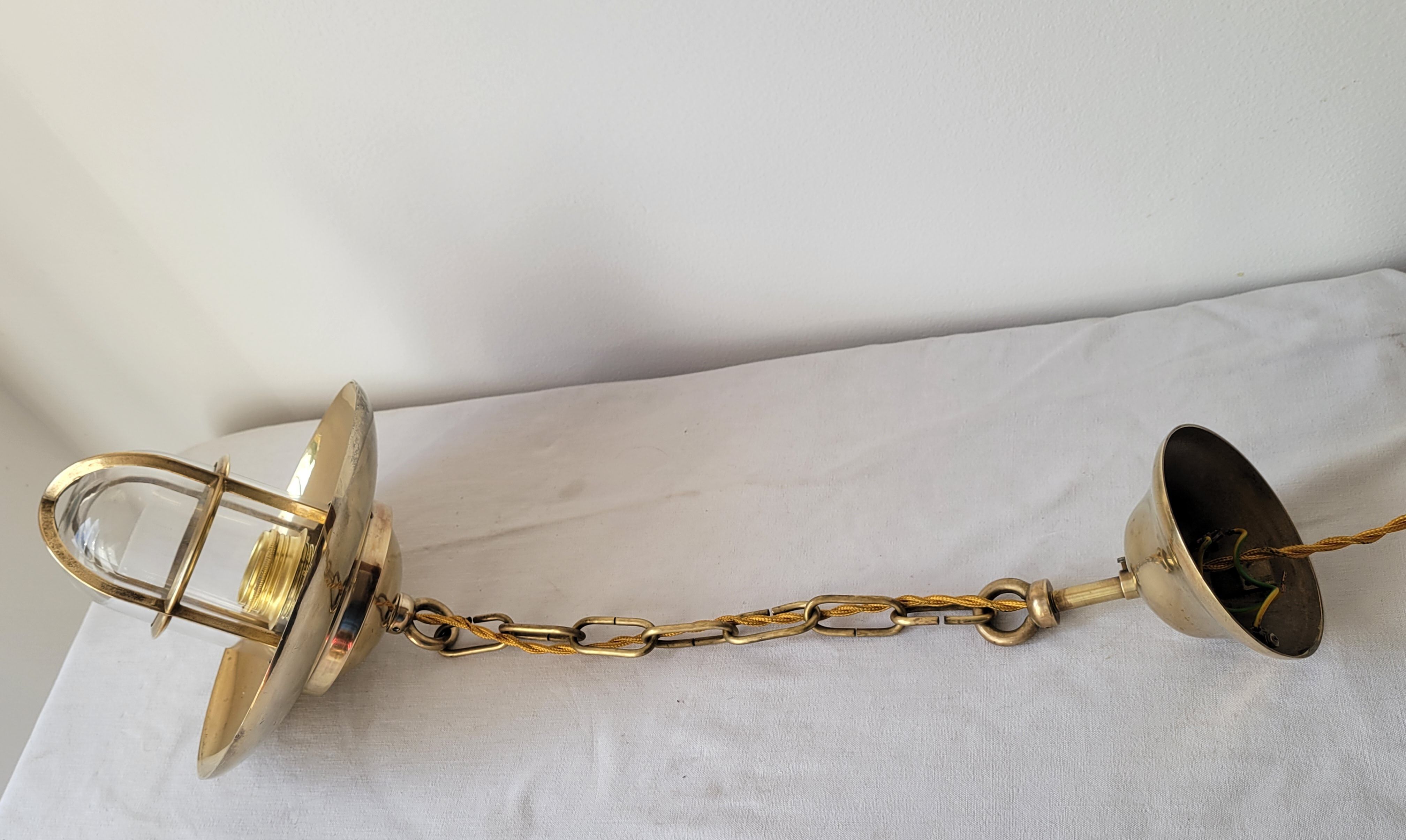 Marine suspension in brass and glass
