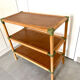 Low bamboo and rattan shelf from the 80s