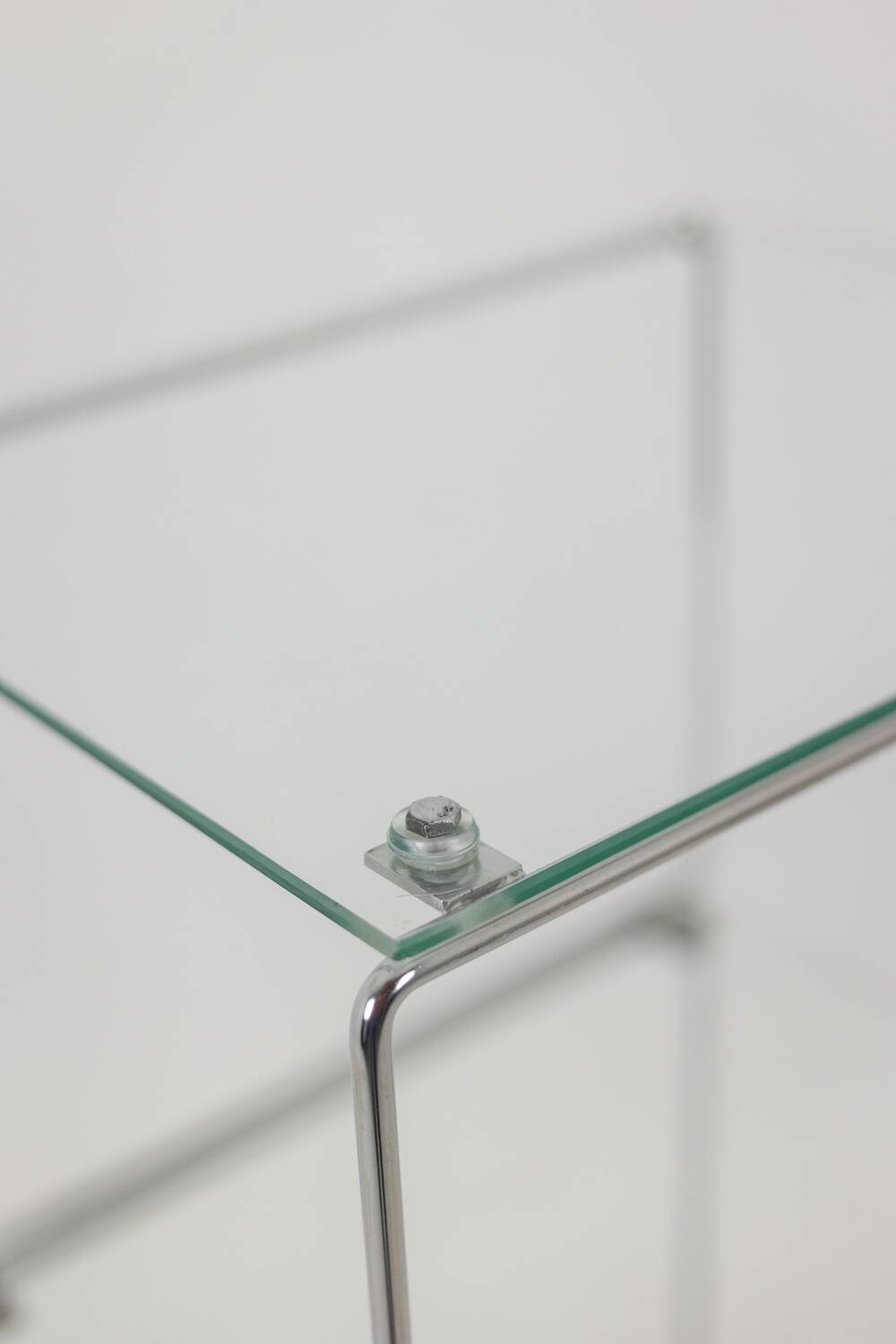 Set of 3 chrome metal and glass shelves. 1970s.