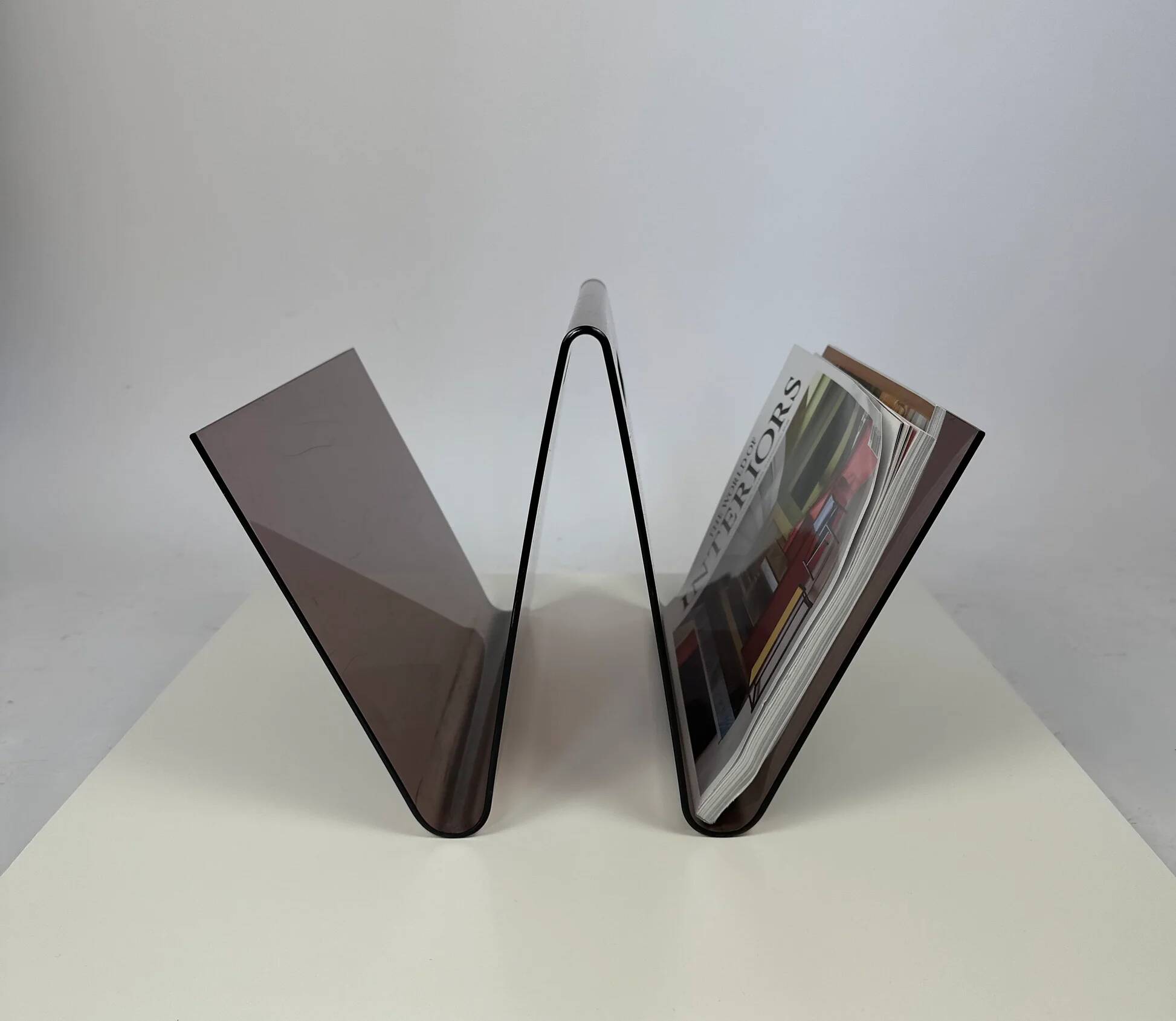 Smoked plexiglass magazine rack in the shape of a W — 1970s