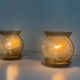 Pair of bronze and glass wall lights from the mid-century, 1960, Italy.
