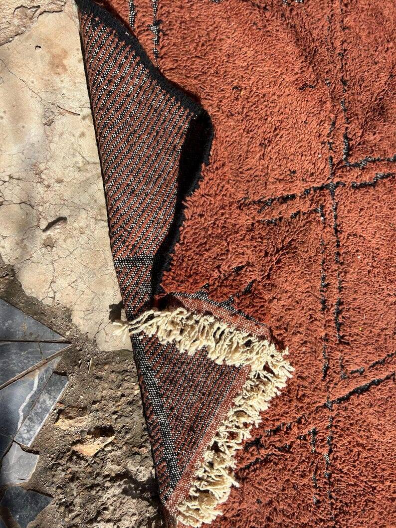 Traditional Beni Ourain Berber rug with brown patterns, 150/250 cm.