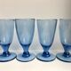 Set of 4 20s blue molded glass foot glasses