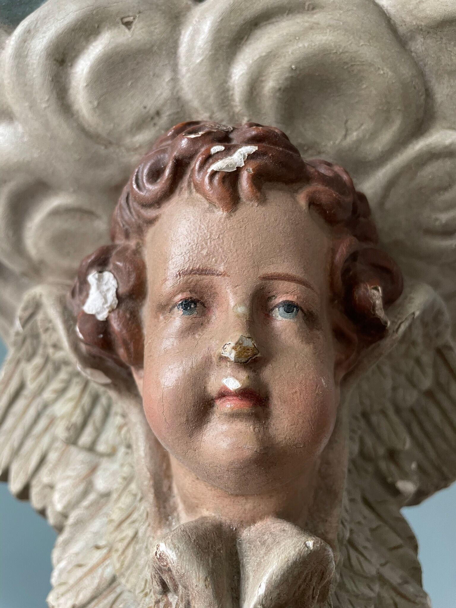 Nineteenth century plaster wall console, cherub decoration