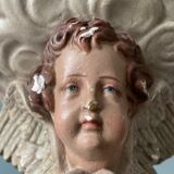Nineteenth century plaster wall console, cherub decoration