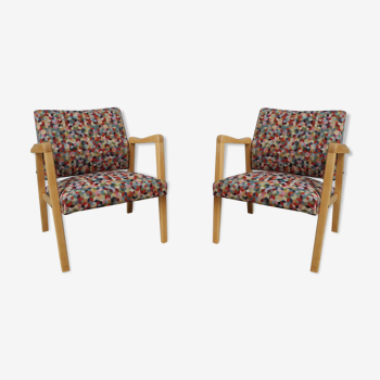 Vintage wood armchairs and fabrics 70s