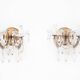 A pair of crystal sconces, France.