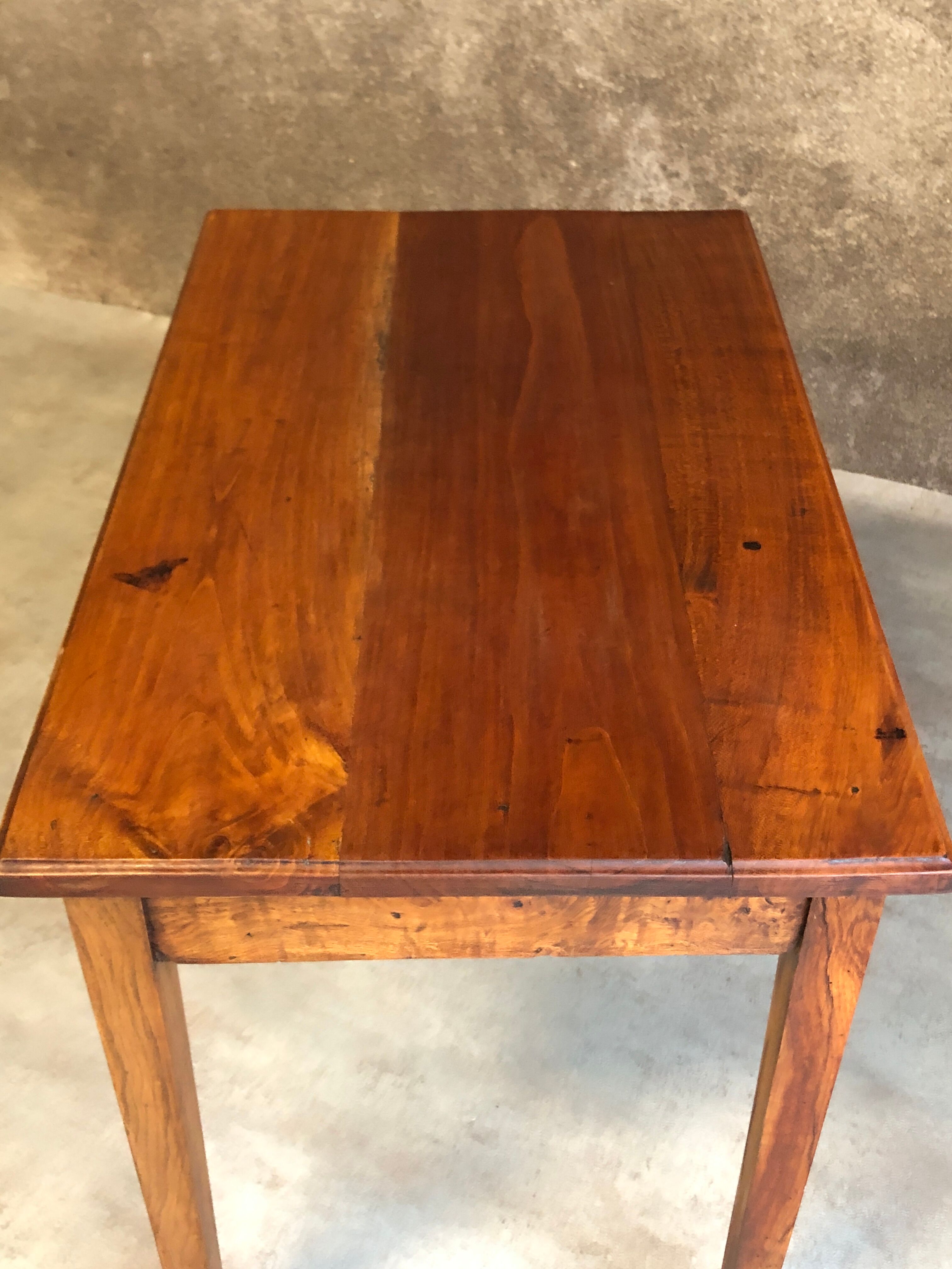 Walnut wood desk with a drawer