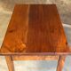 Walnut wood desk with a drawer