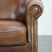 Characterful vintage sturdy 2-seater club sofa made of sheepskin leather