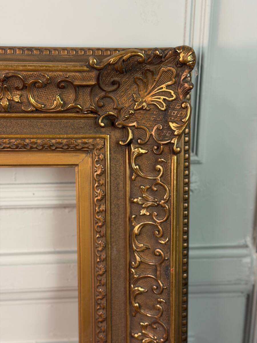Wooden frame with stucco and gilding from around 1900