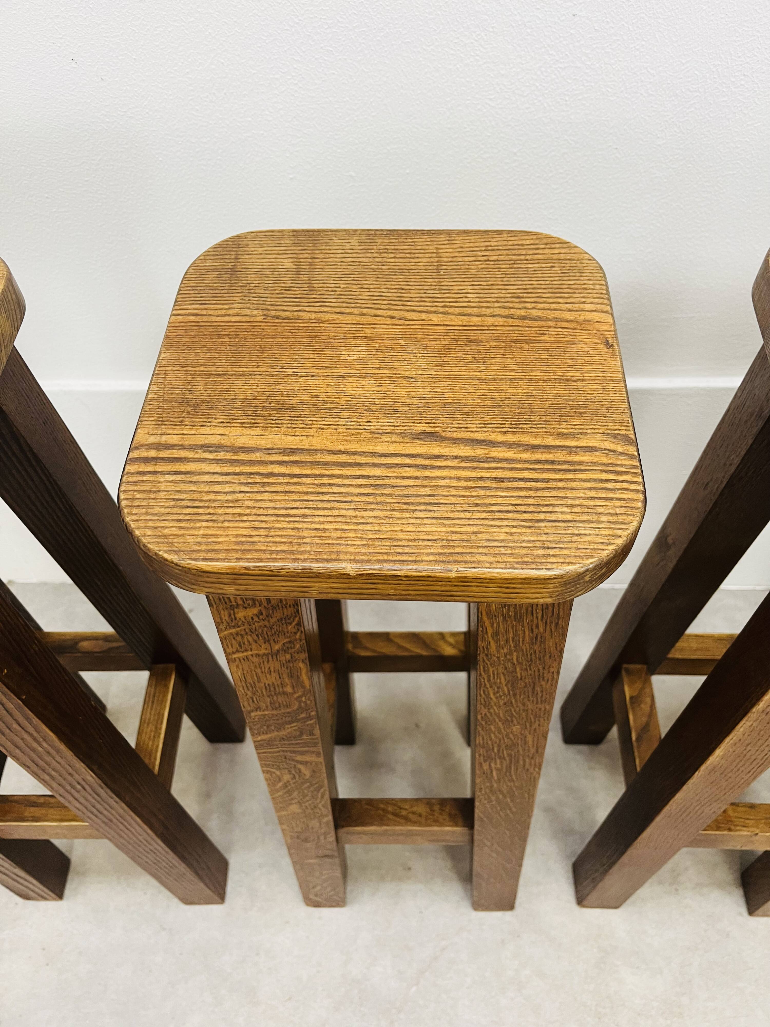 8 solid wood bar stools in brutalist style