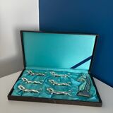 Set of 6 vintage silver metal knife holders and bottle opener, chev design