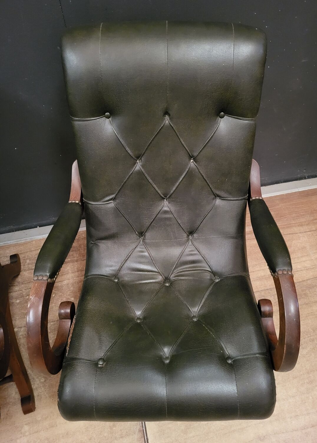 Pair of English Chesterfield armchairs in leather and solid wood