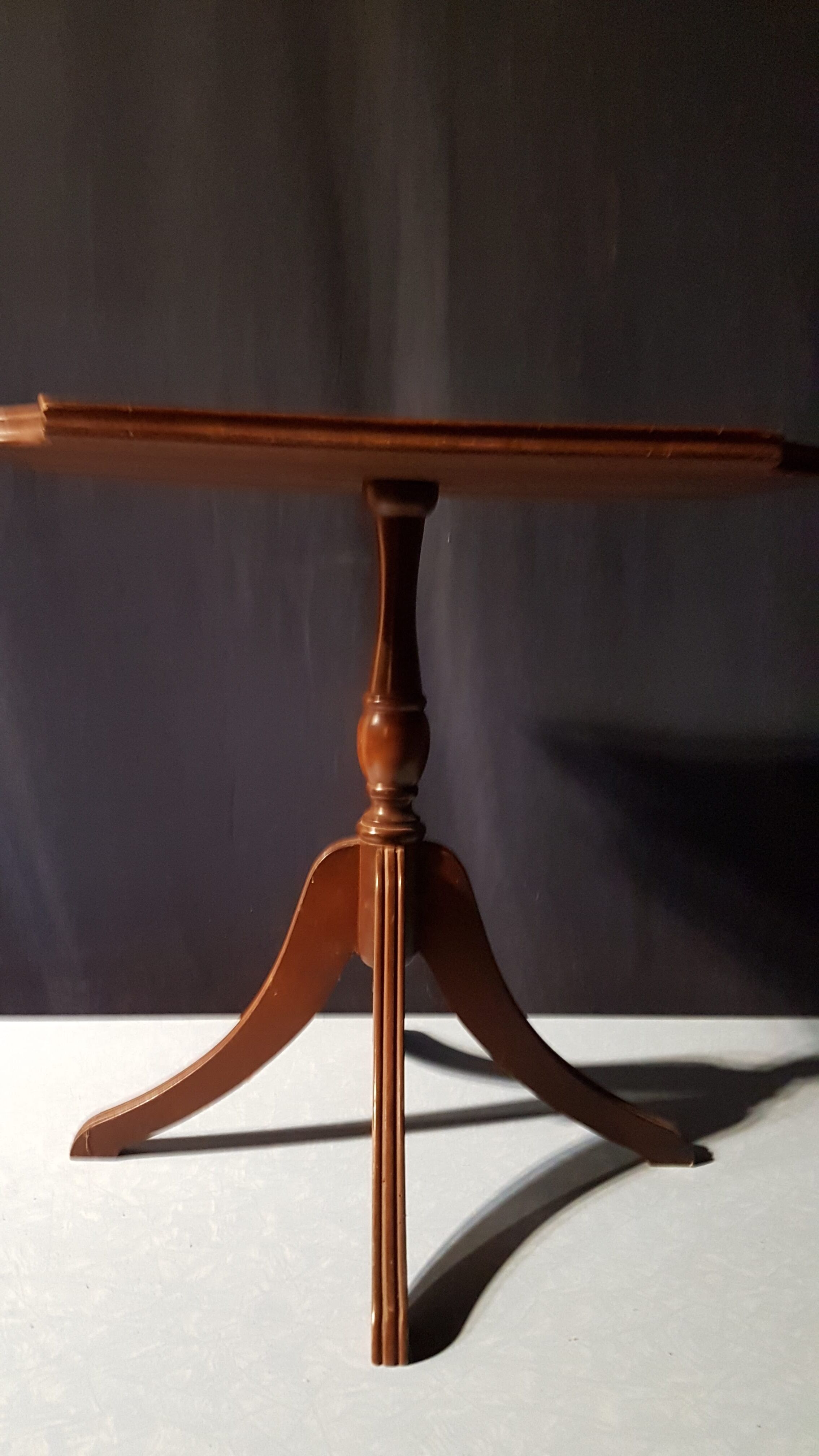 Small wooden and leather side table