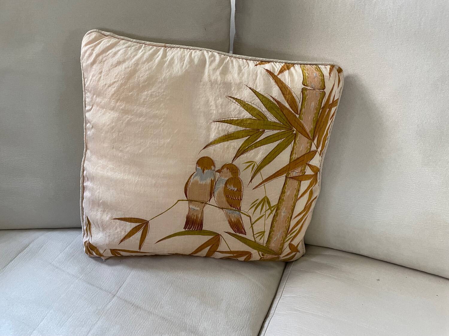 Vintage cushion decorated with birds, Thailand