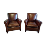 Club armchairs with curved backs