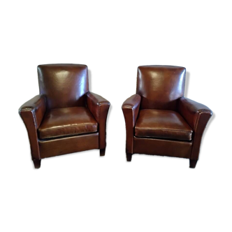 Club armchairs with curved backs