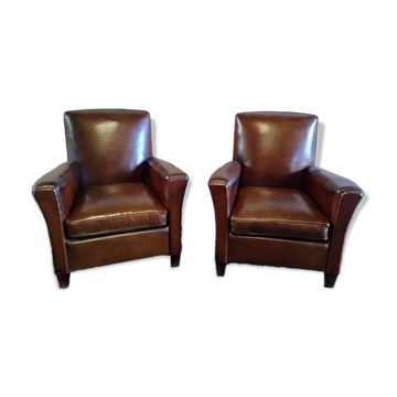 Club armchairs with curved backs