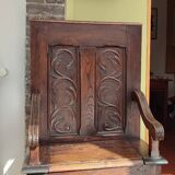 Neo-Gothic style cathedra armchair in carved oak