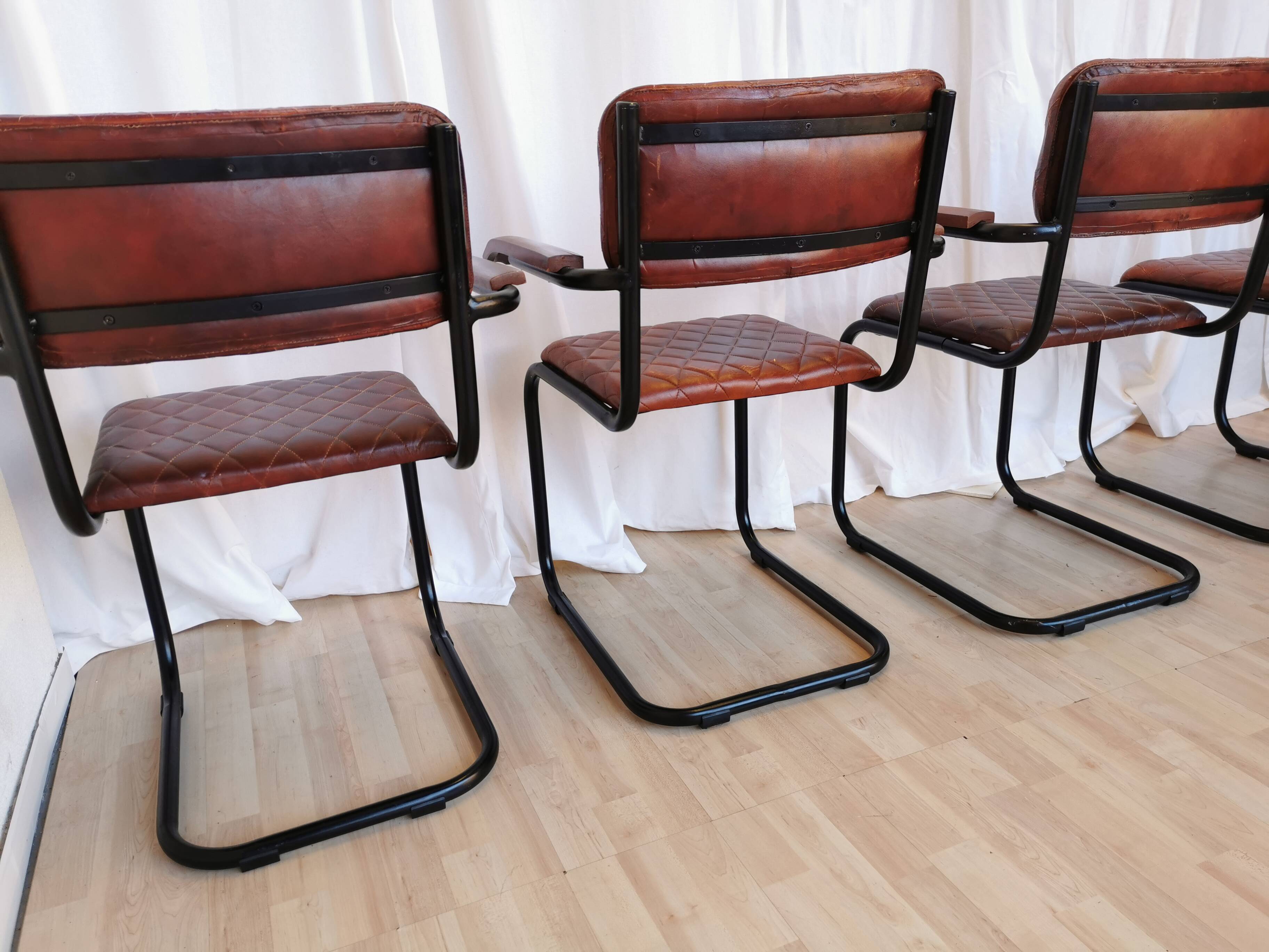 Set of 4 Vintage Quilted Leather Dining Chairs: Black Metal Base