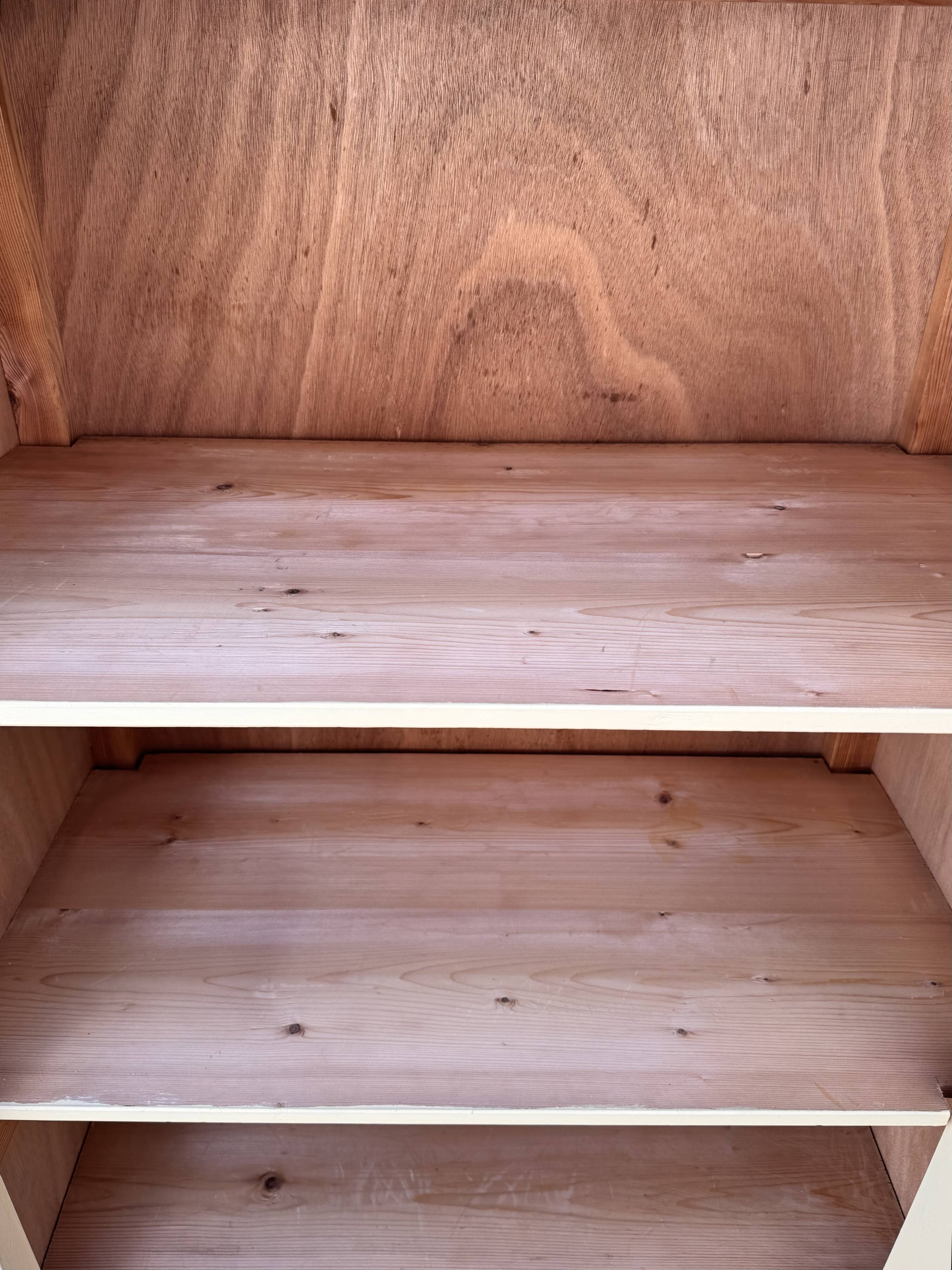 Antique painted wooden bonnet maker