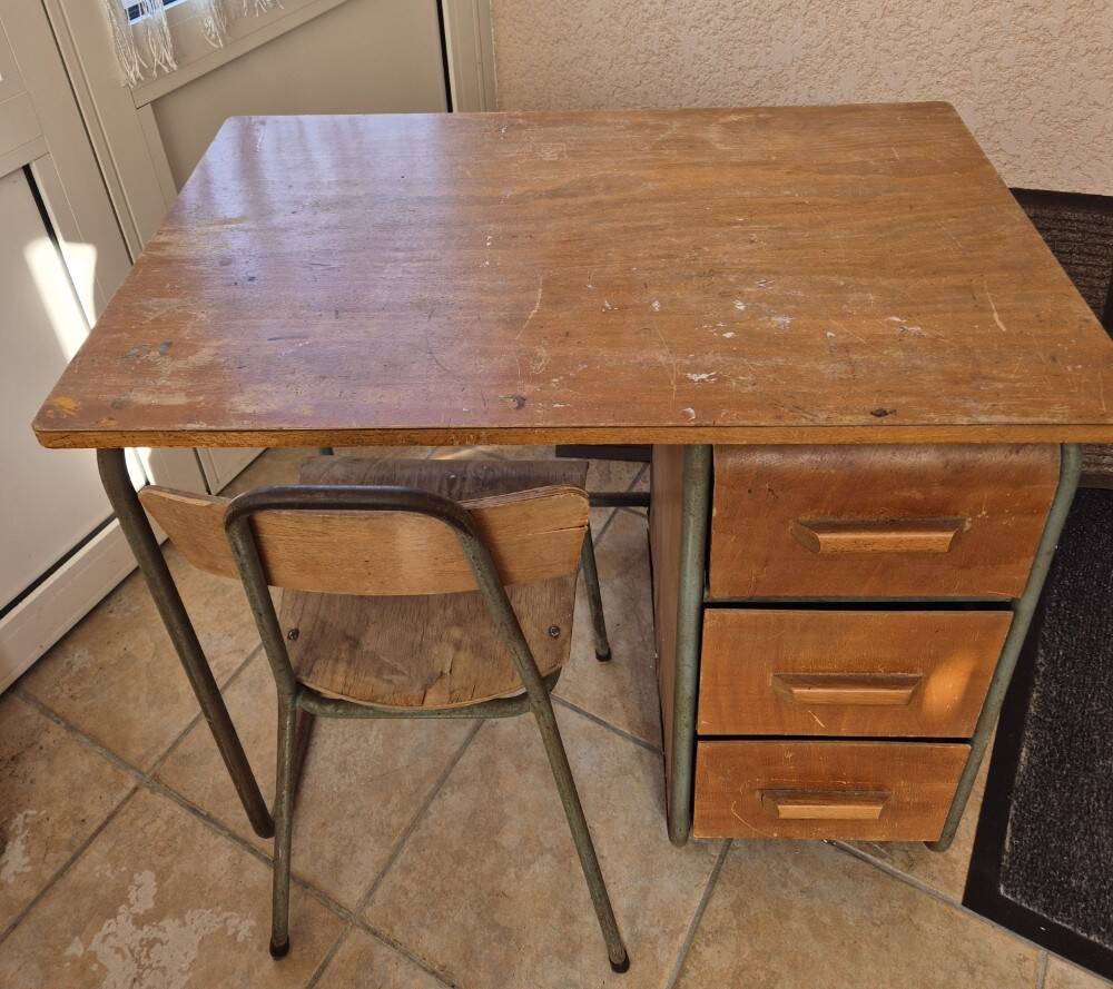 Child's desk with chair in its original condition.
