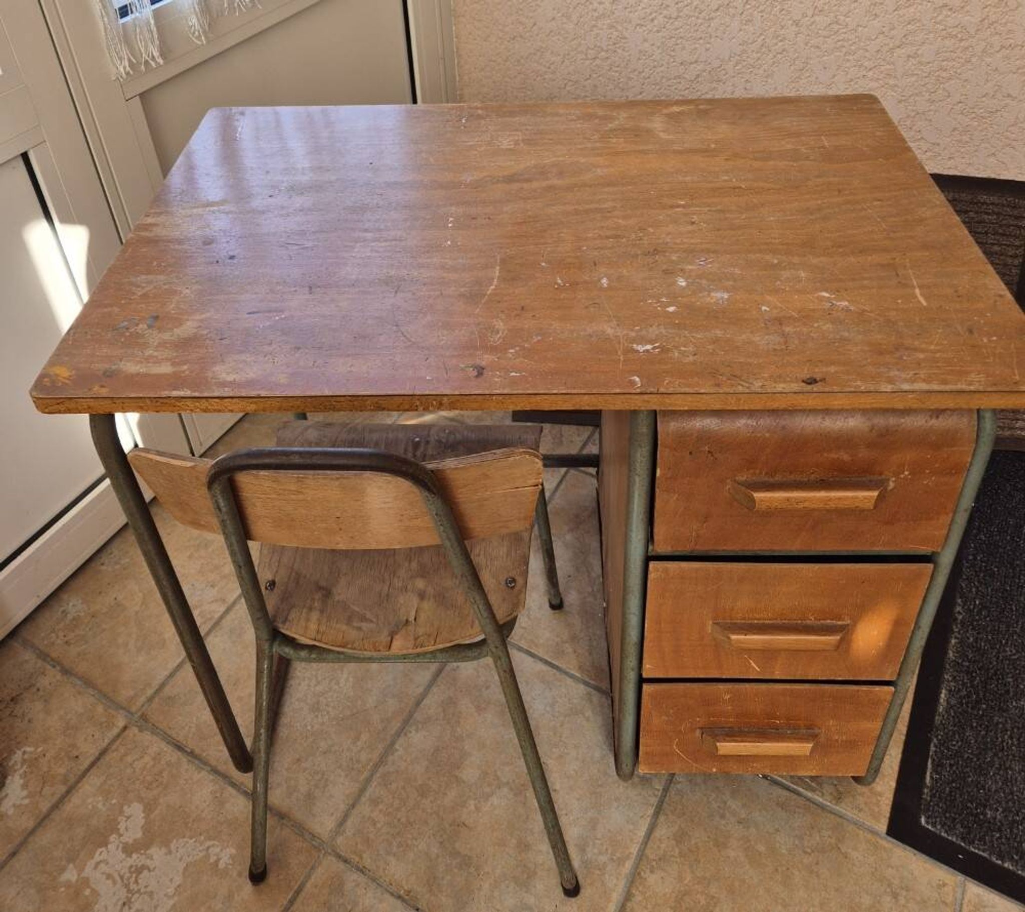 Child's desk with chair in its original condition.