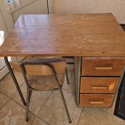 Child's desk with chair in its original condition.