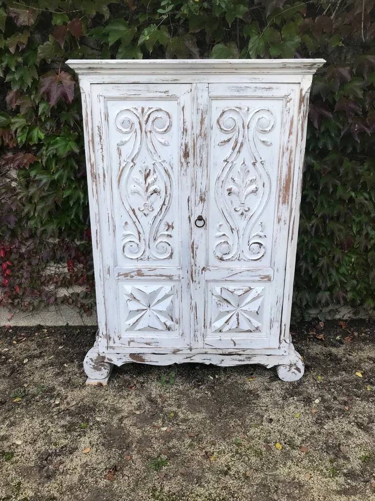 Rustic whitewashed wood cabinet