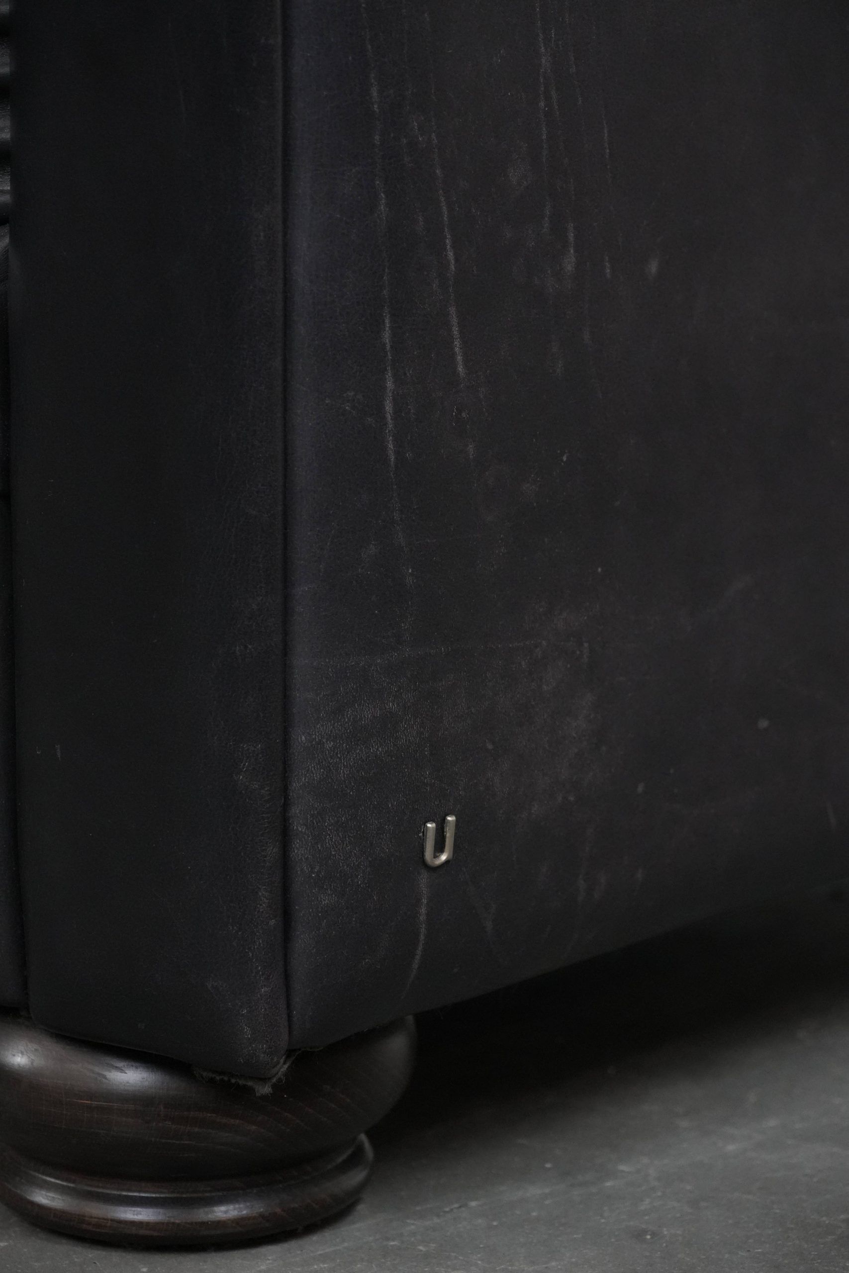 Black chesterfield 3-seater sofa made of cowhide leather in English style